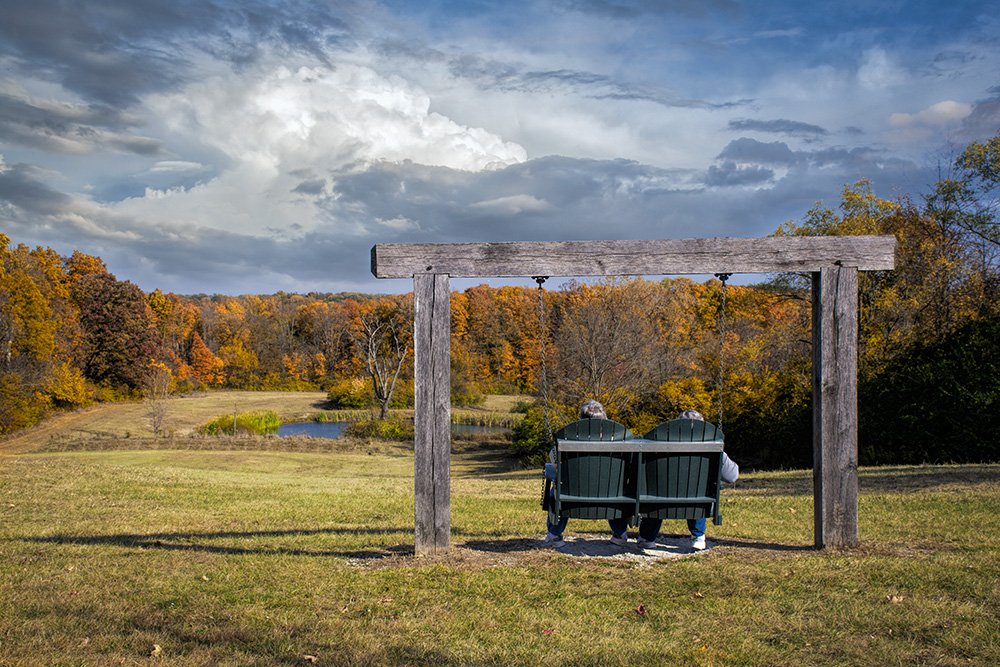 Couple sitting at Taylorsville Five Rivers Metro Park by Dan Cleary in Dayton OHio